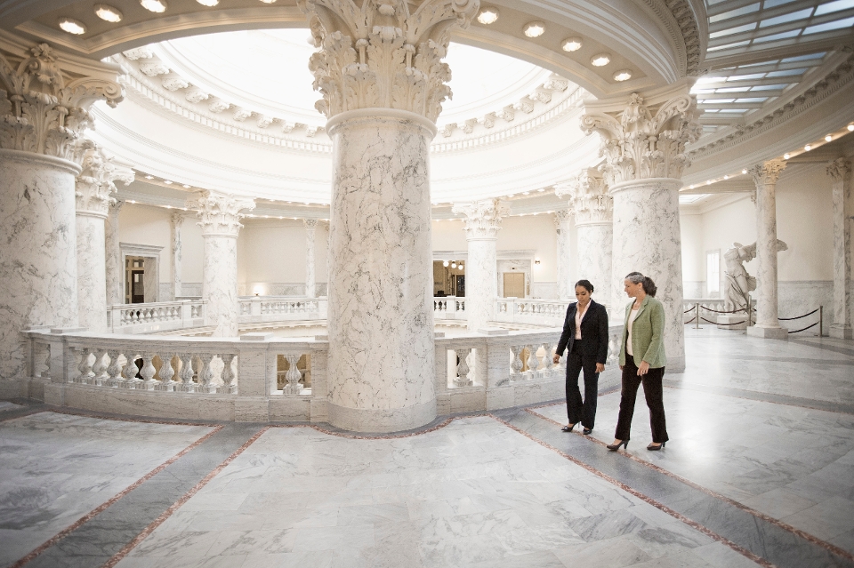 Women walking in an open, bright hall